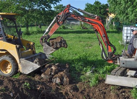 digging a pond with a mini excavator|digging a backyard pond.